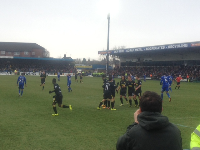 Wigan players celebrate Jordi Gomez's penalty